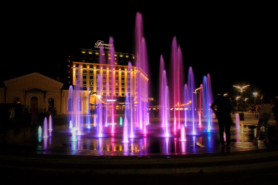 multi-colored night illumination of the fountain in Kiev