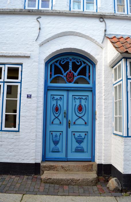 blue doors of a house in Husum, Germany