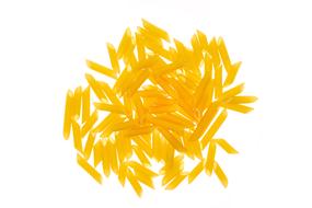 dry yellow pasta on a white background