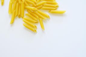 dry long pasta on a white background