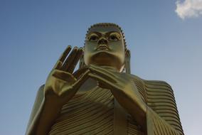 golden buddha sculpture view