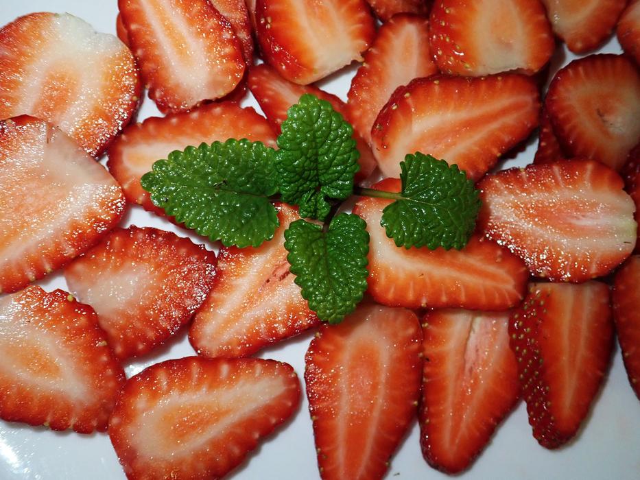 sliced strawberries on the table
