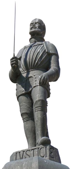 Figure of the executioner with sword, on the stand, in Poznan, Poland, at white background, clipart