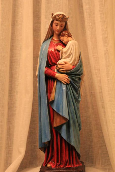 a girl with a baby is a holy sight