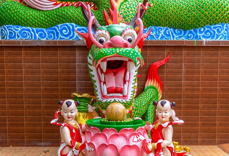 green dragon with people holiday