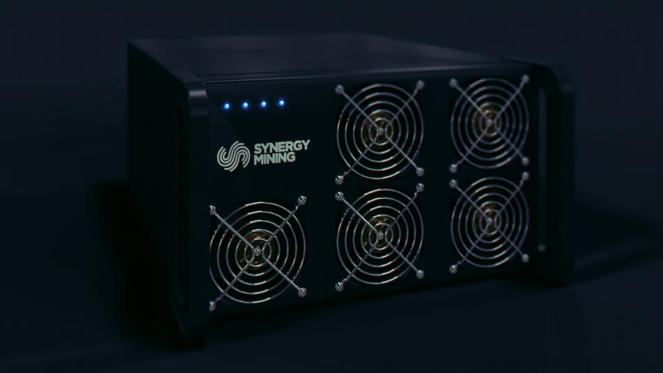 Close-up of the colorful 'Synergy Mining' machine for cryptocurrency, with the lights