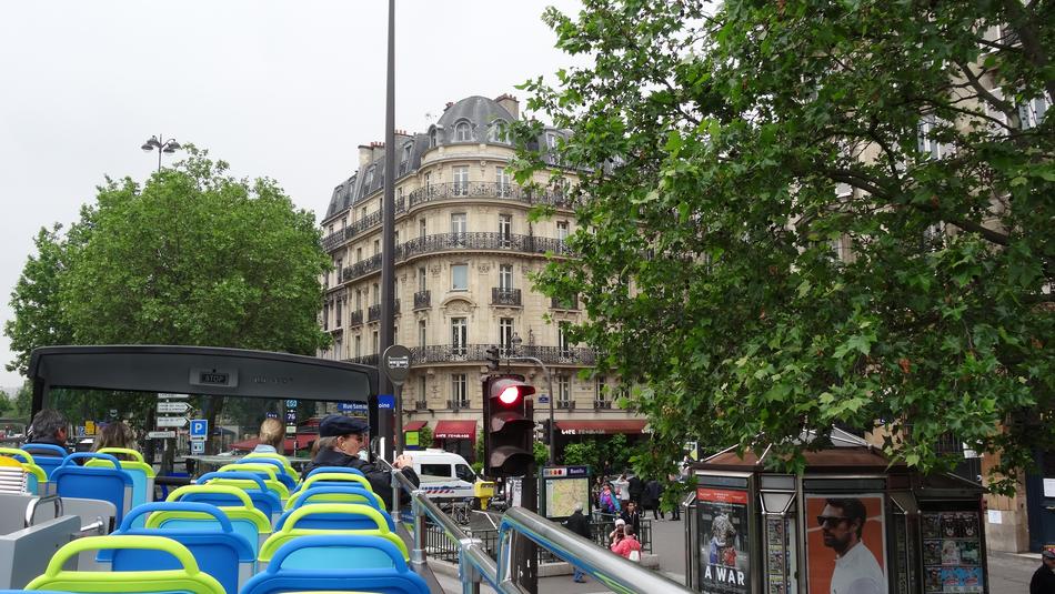 Cars on urban street in Paris