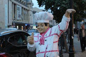 funny cook figure outside