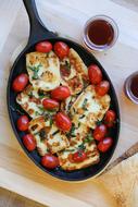 Breakfast with grilled cheese and tomatoes