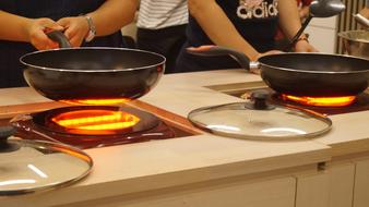 Cooking on a burning stove
