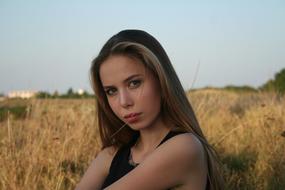 girl in the wheat field in summer