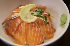 Salmon with lemon in a plate