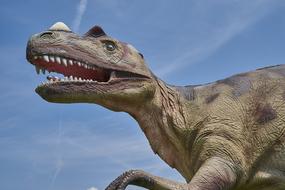 Dinosaur model at sky, Prehistoric Carnivore reptile