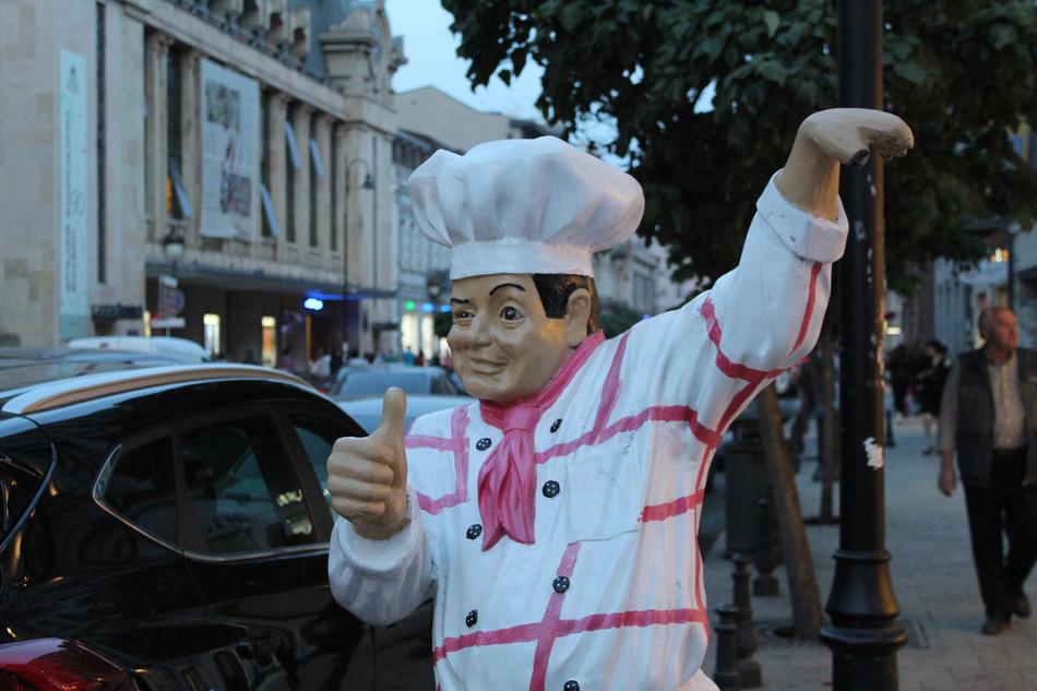 funny cook figure outside