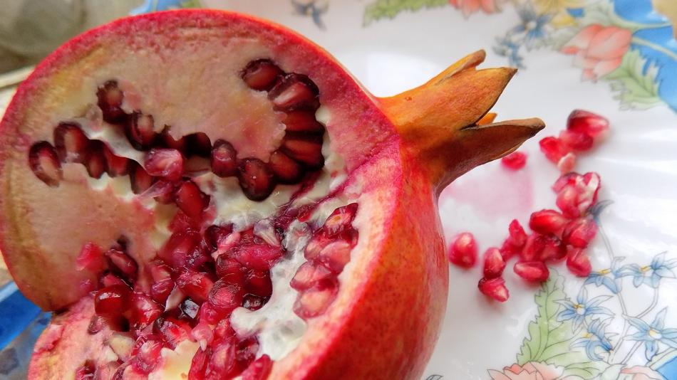 cut pomegranate on the table
