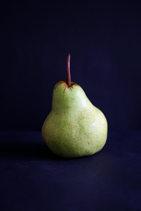 sweet ripe pear on a blue background