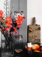 beautiful flowers with fruit on the table