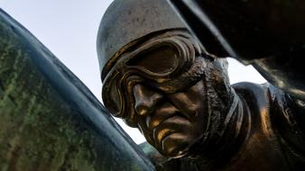 Portrait of the shiny sculpture of the person with goggles