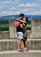 happy couple in front of the castle