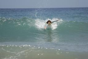 Surfer woman in sea