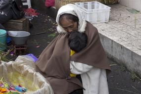 woman with a child on the street