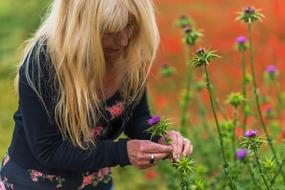 Girl and flowers in garden