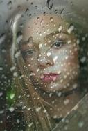 Water Drops on window and Girl
