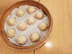Delicious dumplings with meat in a bowl