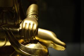 golden hands and feet of buddha