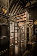 Beautiful interior of the Chethams Library with colorful books on the bookshelves in England