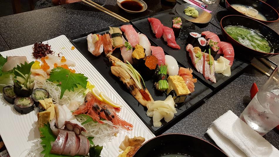 variety of sushi on a plate