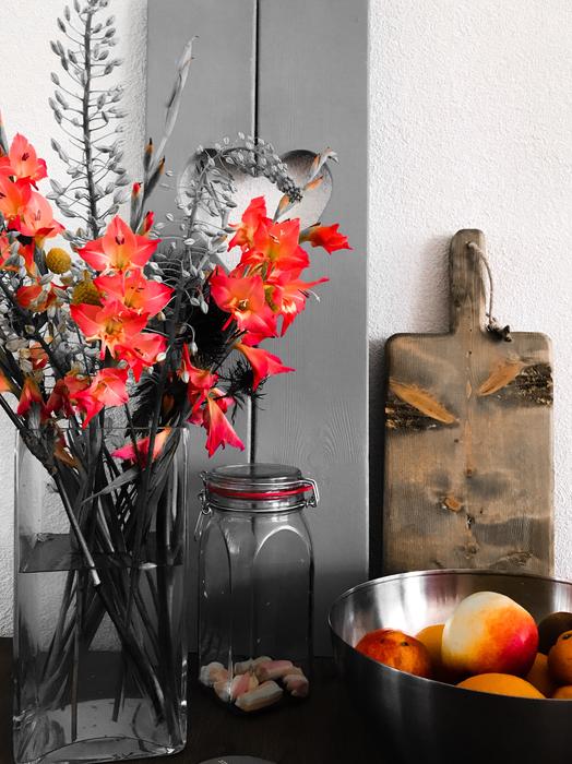 beautiful flowers with fruit on the table