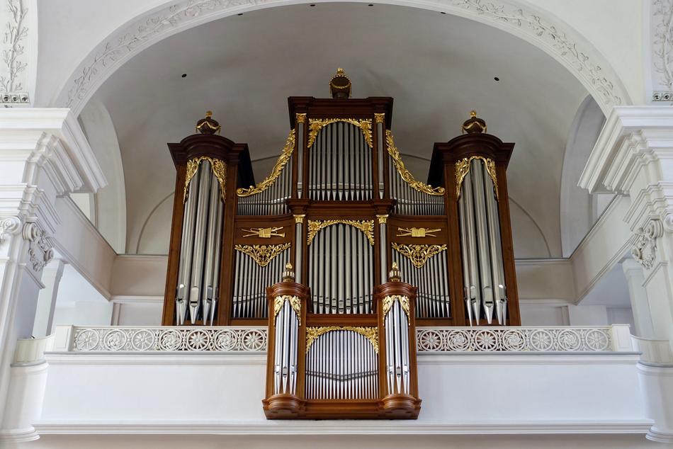 wooden organ in the white church
