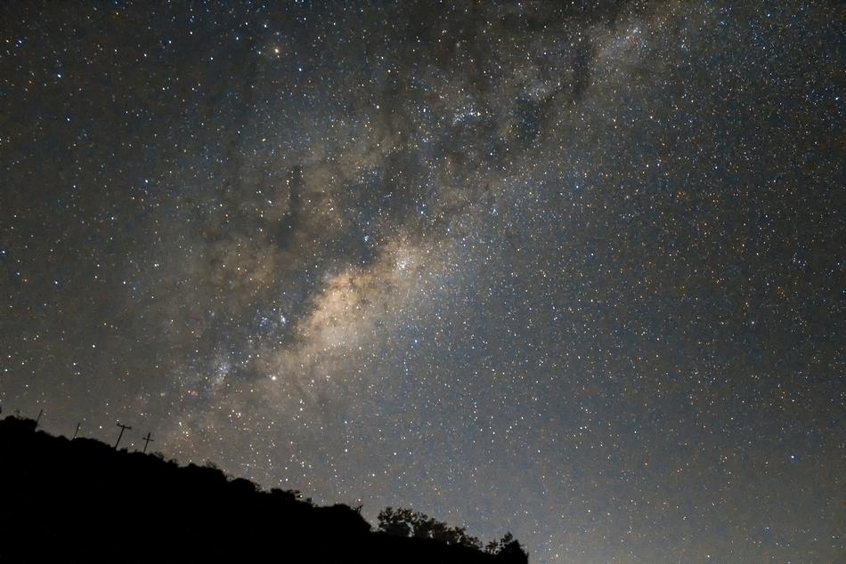 Milky Way in sky at snowy winter night