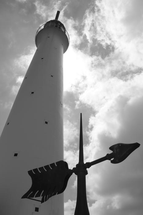 white beacon with a black mark