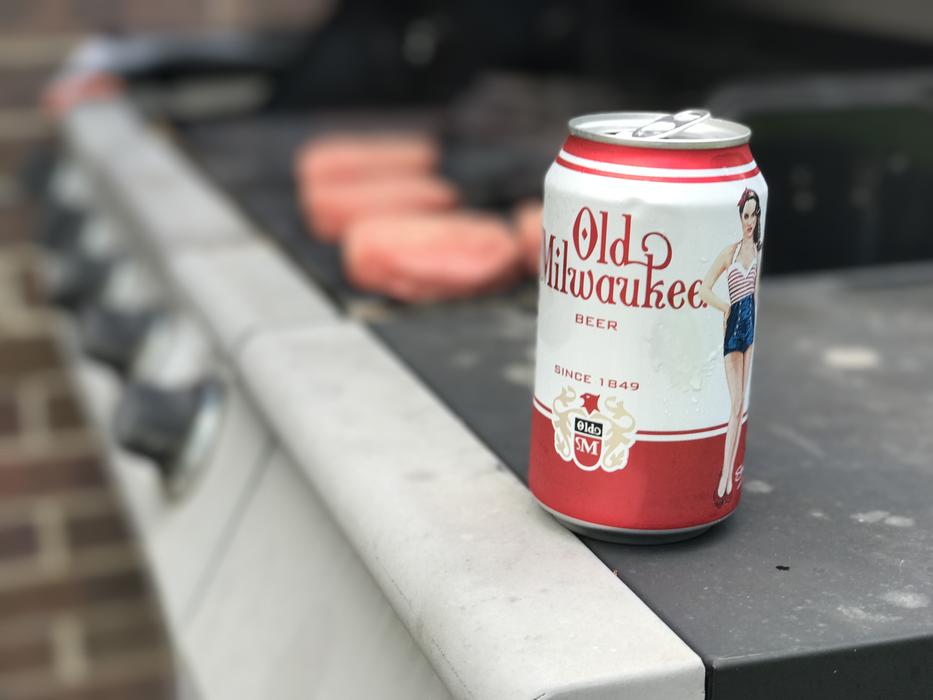 iron can of beer on the grill