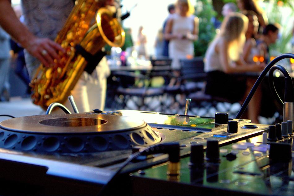 person playing at dj’s workplace