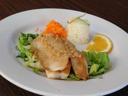 Juicy fish and vegetables on a plate