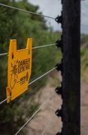 Electric Fence Wire yelow sign