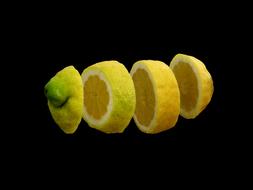 sliced lemon on a black background
