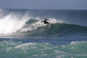 man waves ocean
