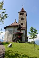 a beautiful building in the meadow