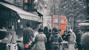 black and white photo of the market with people
