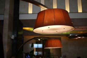 a burning lamp at night in a cafe