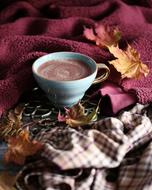 hot coffee in leaves