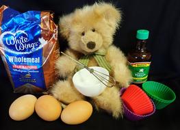 soft teddy bear by the egg