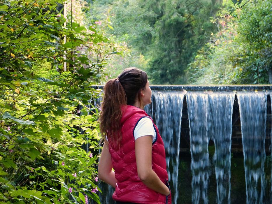 a girl on the background of a fountain