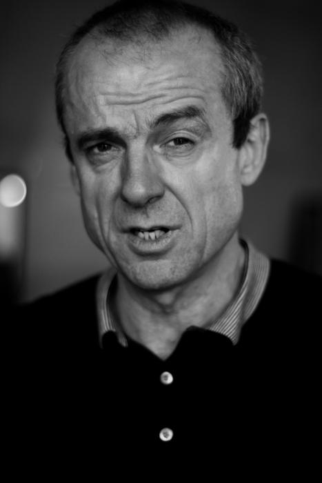 Black and white portrait of the talking man in shirt