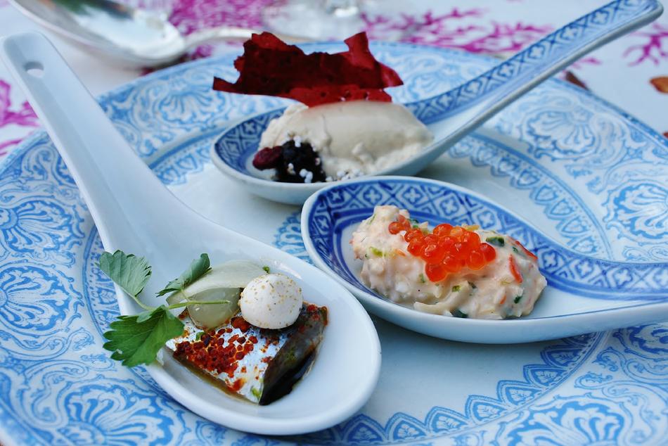 salad in blue spoons