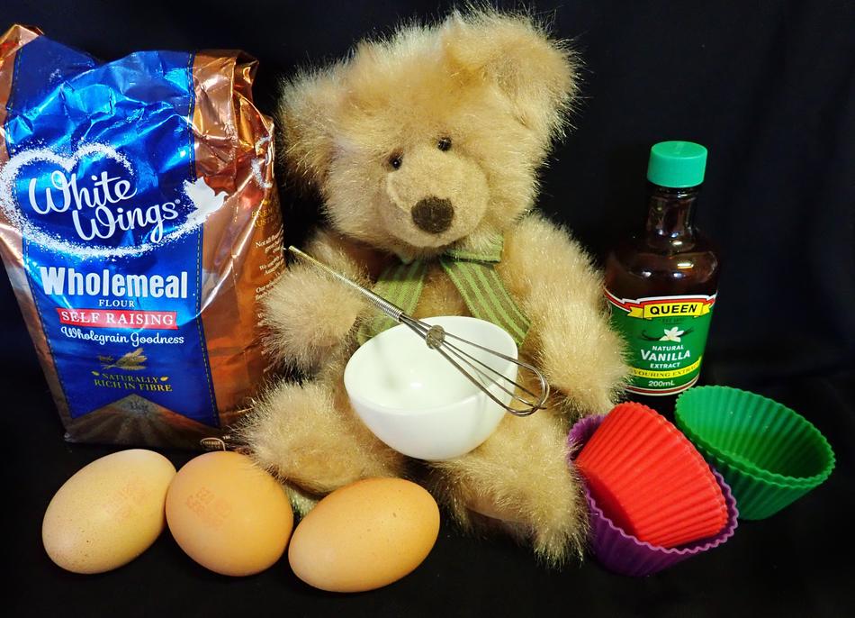 soft teddy bear by the egg